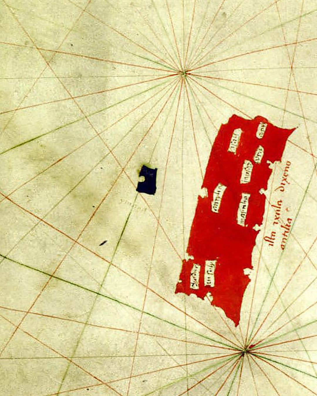 Pormenor da carta de marear feita em Veneza em 1424, quase de certeza por Zuane Pizzigano: a ilha Antília, um retângulo vermelho de costa recortada, com pequenas cartelas de nomes e, ao lado, a legenda que lhe dá o nome (James Ford Bell Library, Universidade do Minnesota; Wikimedia Commons, domínio público).