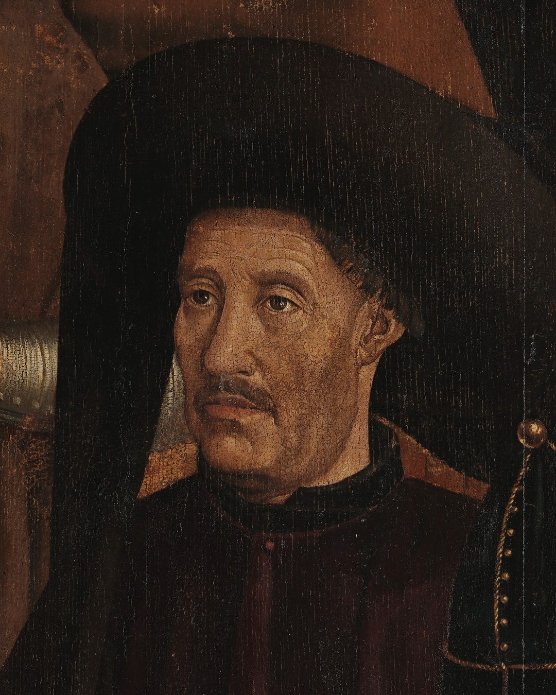 Pormenor dos Painéis de São Vicente (Museu Nacional de Arte Antiga, Lisboa): o «homem do chapeirão», em quem se reconheceu o Infante pela semelhança com a iluminura do códice de Paris (domínio público).